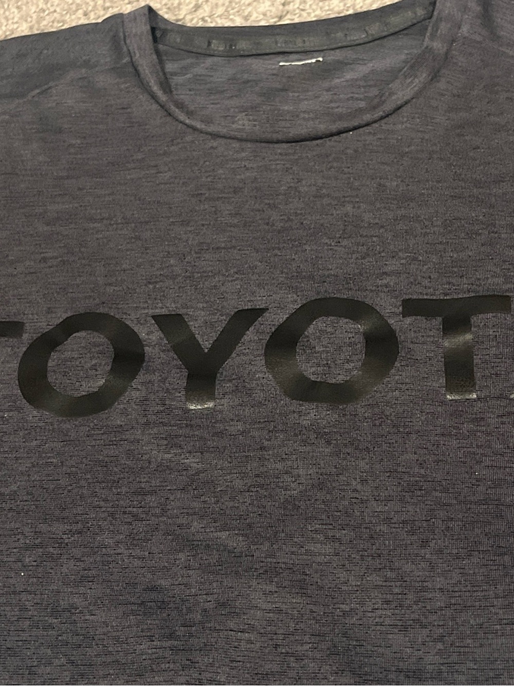 New Era Men's Short Sleeve Heather Charcoal Gray Tee with Black Gloss Logo